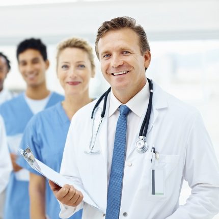 Successful team of doctors, female with the clipboard